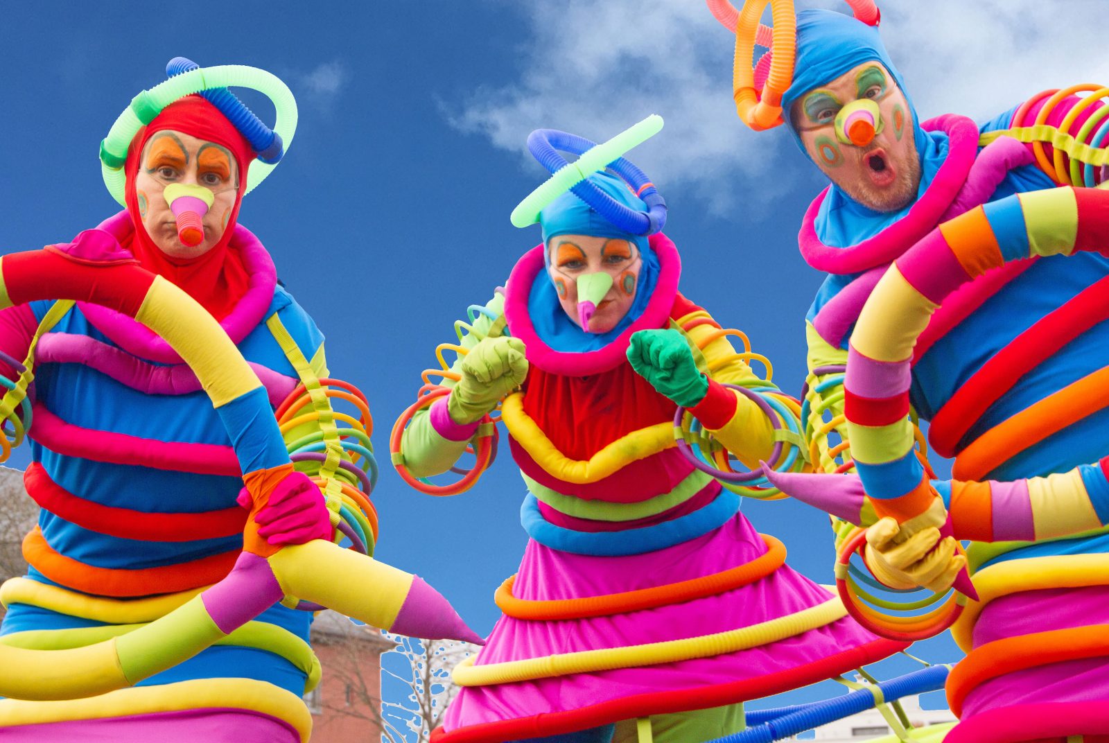 Multi Coloured Stilt Walkers Book Stilt Walkers For Events Hire